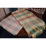 Two similar multicoloured checked blankets. (B.P. 21% + VAT)