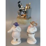 Two Royal Doulton bone china figurines; 'The Snowman Gift Collection', 'Lady Snowman' and 'Cowboy