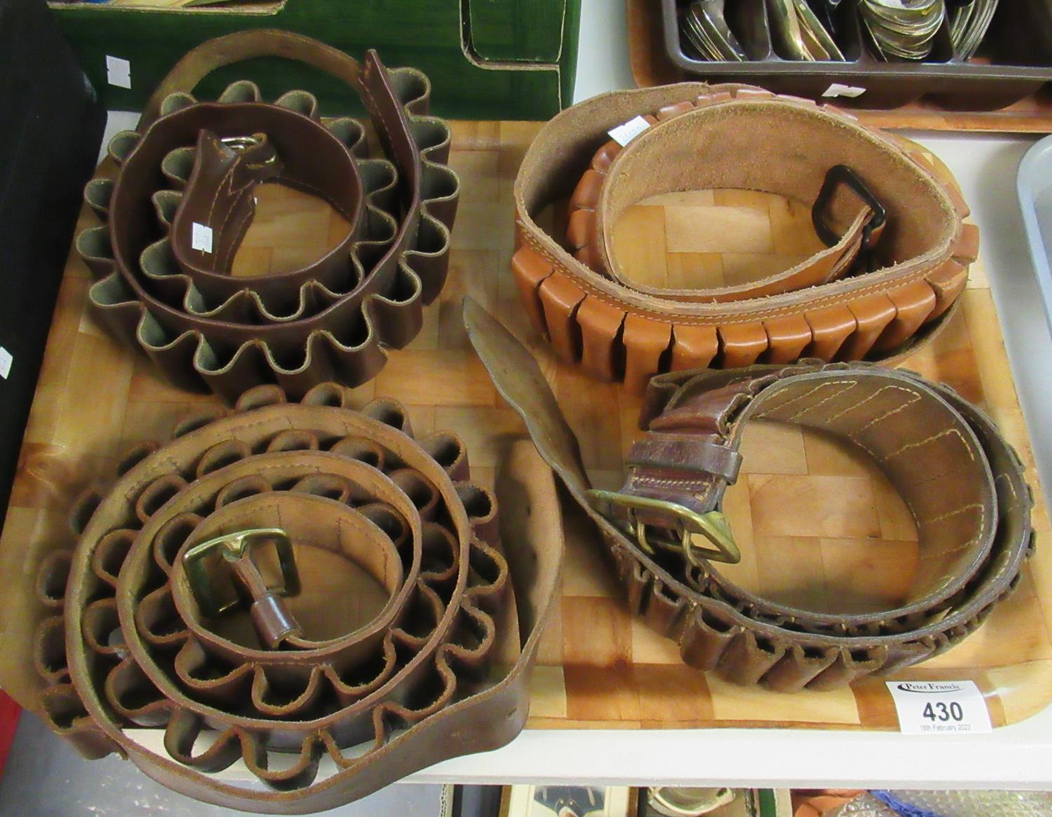 Four leather ammunition belts. (B.P. 21% + VAT)