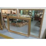Pair of modern mirrors overall with gilded and moulded foliate frame, together with another gilt