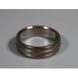 Titanium band ring. Ring size U. Approx weight 4.3 grams. (B.P. 21% + VAT)