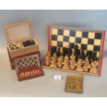 Boxwood and ebony St George's style chess set with playing board, a small booklet The Art of Chess
