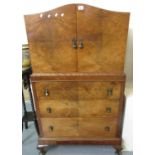 Mid century walnut bedroom serpentine design two-door blind panel cupboard above three fitted