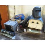 Superspark welder together with welding rods, mask, a heavy metal box containing allen keys,