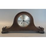 Early 20th century oak hat-shaped eight day mantel clock with silvered face. (B.P. 21% + VAT)