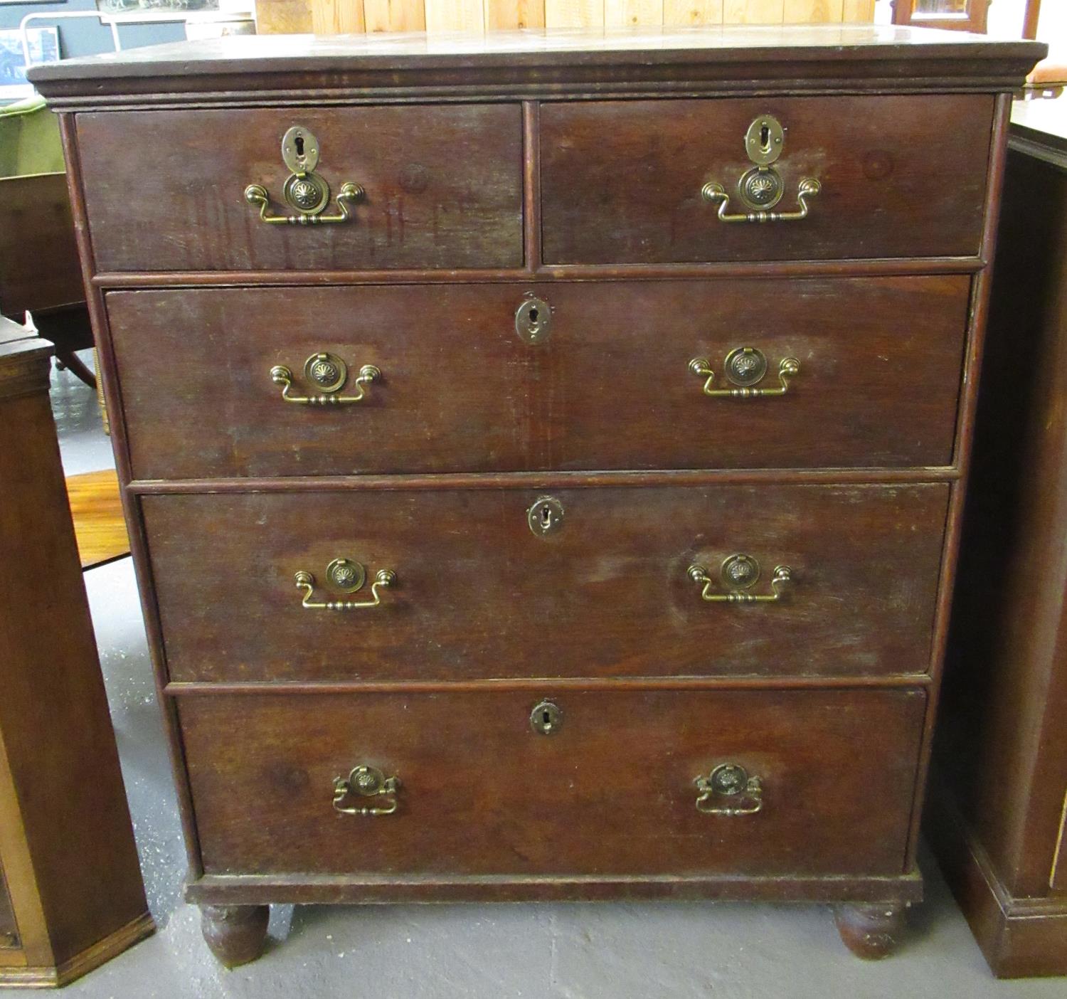 19th century oak straight front chest of two short and three long drawers on baluster turned feet.