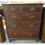 19th century oak straight front chest of two short and three long drawers on baluster turned feet.