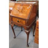 20th century walnut bureau of narrow proportions, standing on cabriole legs and pad feet. 46cm