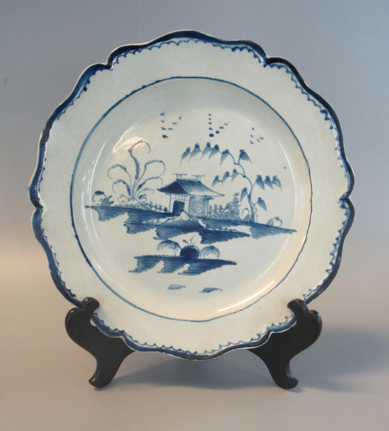 19th century English pearlware indented rim plate with hand painted underglaze blue pagoda