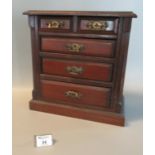 Edwardian mahogany miniature apprentice straight front chest of two short and three long drawers, on