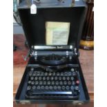 Cased vintage Remington Rand type writer with instruction manual. (B.P. 21% + VAT)