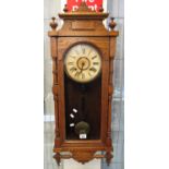 Early 20th century oak two-train Ansonia American wall clock. (B.P. 21% + VAT)