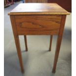 Early 20th century oak lady's work box of plain form, having hinged lid above tapering legs,