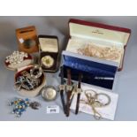 Tub of oddments to include ladies wrist watches, circular vesta case fob, enamelled pendant and