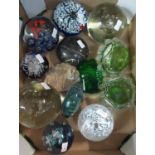 Box of assorted glass paperweights, bubbled glass paperweights, others in the form of octopus,