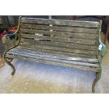 Garden seat with cast metal ends and wooden slats. (B.P. 21% + VAT)