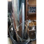 Collection of assorted cane and other fishing rods, landing net etc (B.P. 21% + VAT)