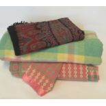 Welsh multicoloured carthen, together with another Welsh checked blanket, and a paisley shawl or