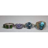 Four silver gemset rings. Ring size N and N&1/2. (B.P. 21% + VAT)