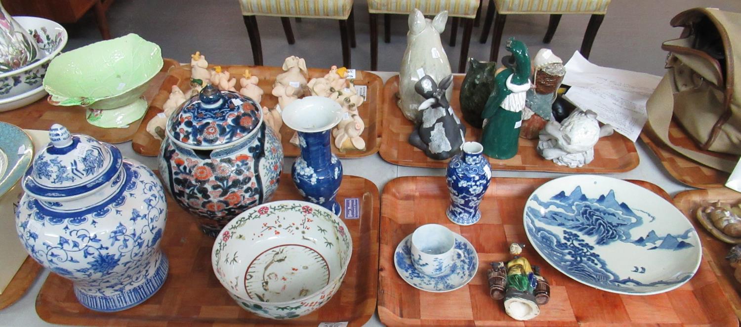 Two trays of mainly Oriental items to include prunus blossom vases, Imari design jar and cover,