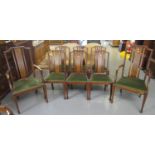 Set of eight Edwardian mahogany inlaid dining chairs. (6+2). All standing on square tapering legs