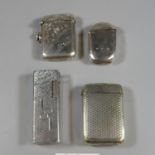 Two silver vesta cases, together with a silver plated engine turned vesta case, and a vintage