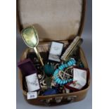 Suitcase of assorted costume and other jewellery, silver necklace and bracelet, vanity set items,