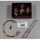 Box of 9ct gold to include three chains, bangle, pendant, and stone bracelet. 20g approx. (B.P.