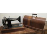 Vintage Singer sewing machine in oak bentwood case. (B.P. 21% + VAT)