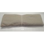 Roll of check fabric. (B.P. 21% + VAT)