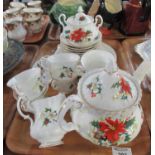Tray of Royal Albert fine bone china Poinsettia tea ware to include teapot, six cups and saucers,