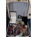 White vanity case comprising vintage and other jewellery, Jack Daniels hipflask, dressing table