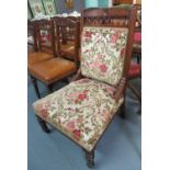 Late Victorian walnut upholstered bedroom chair on ring turned legs and castors. (B.P. 21% + VAT)
