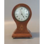 Edwardian inlaid oak balloon-shaped mantel clock with French brass trunk-shaped movement. With