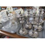 Two trays of assorted items to include: two pairs of white metal candlesticks embossed with flowers,