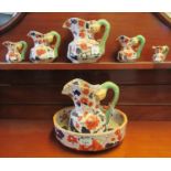 Collection of Masons Ironstone style graduated jugs and bowl in the Imari pattern. (