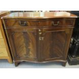 Reproduction mahogany serpentine two door blind panel sideboard with dummy drawer, on bracket