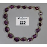 Victorian style amethyst paste necklace set in yellow metal. Approx weight 33.7 grams.