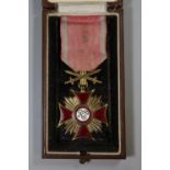 Polish Cross of Merit with swords medal, marked RP (Republic of Poland), first class in red and