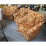 Good quality modern three-piece upholstered suite on a red ground with floral and fruit decoration