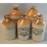 Collection of stone ware flagons to include Property of Monis G.L. Trickett, Wolverhampton, South