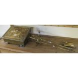Brass 'Slippers' slope front box, together with a brass companion set. (B.P. 21% + VAT)