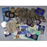 Plastic box of assorted commemorative coins, British, together with a 2 pound uncirculated coin,