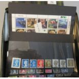 Great Britain selection of u/m mint stamps commems and defins 2000to 2011 period on black cards in