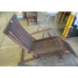 Pair of modern teak steamer type chairs with cushions. (2) (B.P. 21% + VAT)