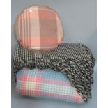 Welsh multicoloured honey comb blanket, together with a black and white checked Welsh shawl and a