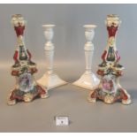 Pair of early 20th century Austrian porcelain candlesticks with scenic panels of semi-nude