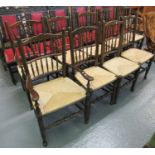 Set of nine Lancashire style oak and elm spindle back kitchen chairs on rush seats. (7 + 2) (B.P.
