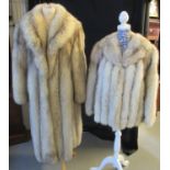 Two vintage blue fox furs, a coat and jacket, each with self lined collars and leather strip