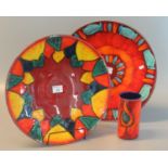 Two modern Poole Pottery dishes/chargers, one in the 'Volcano' pattern. 39 & 40cm diameter approx.